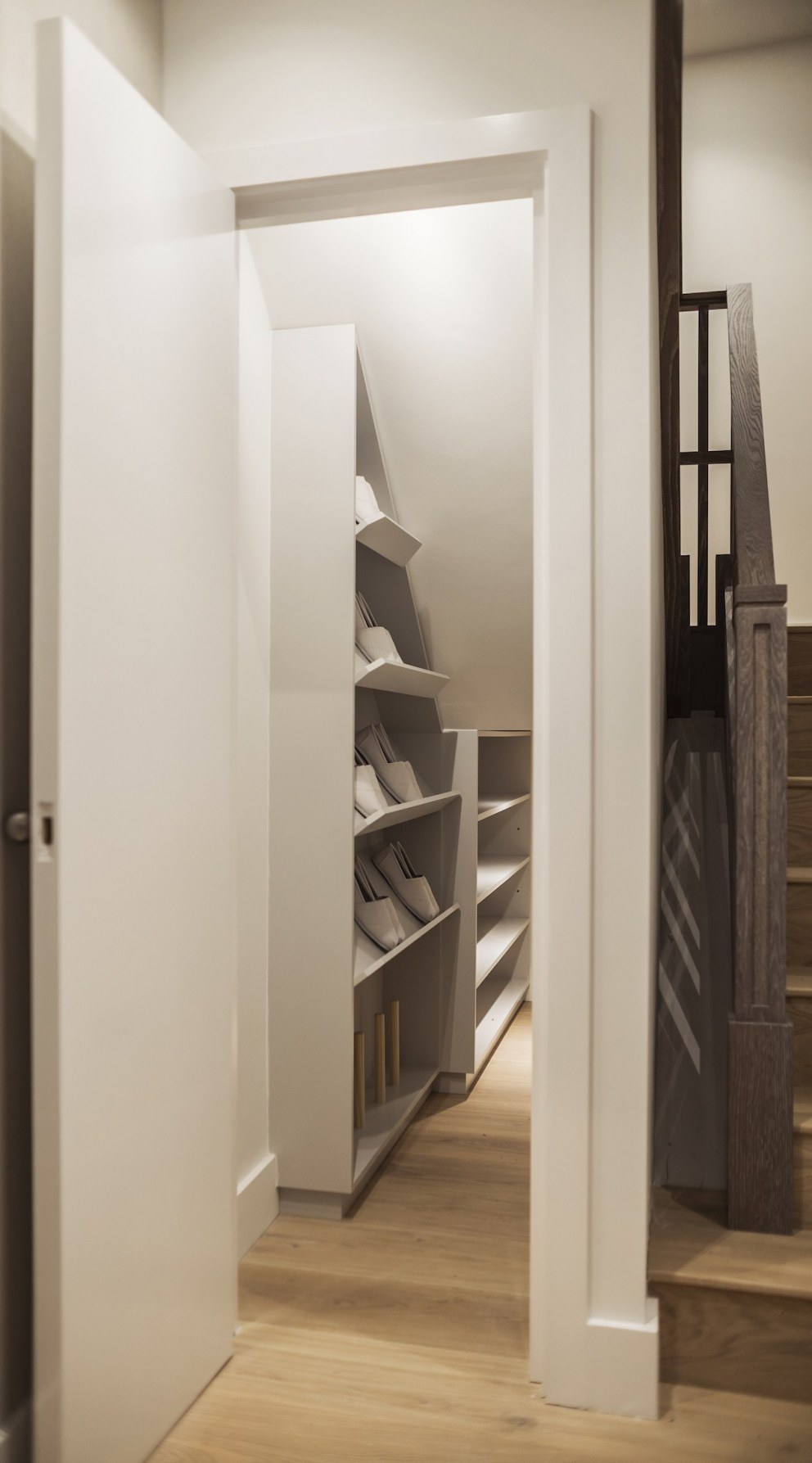 3000 sqft Townhouse - Highgate | Understair cupboard with bespoke shoe storage unit | Interior Designers